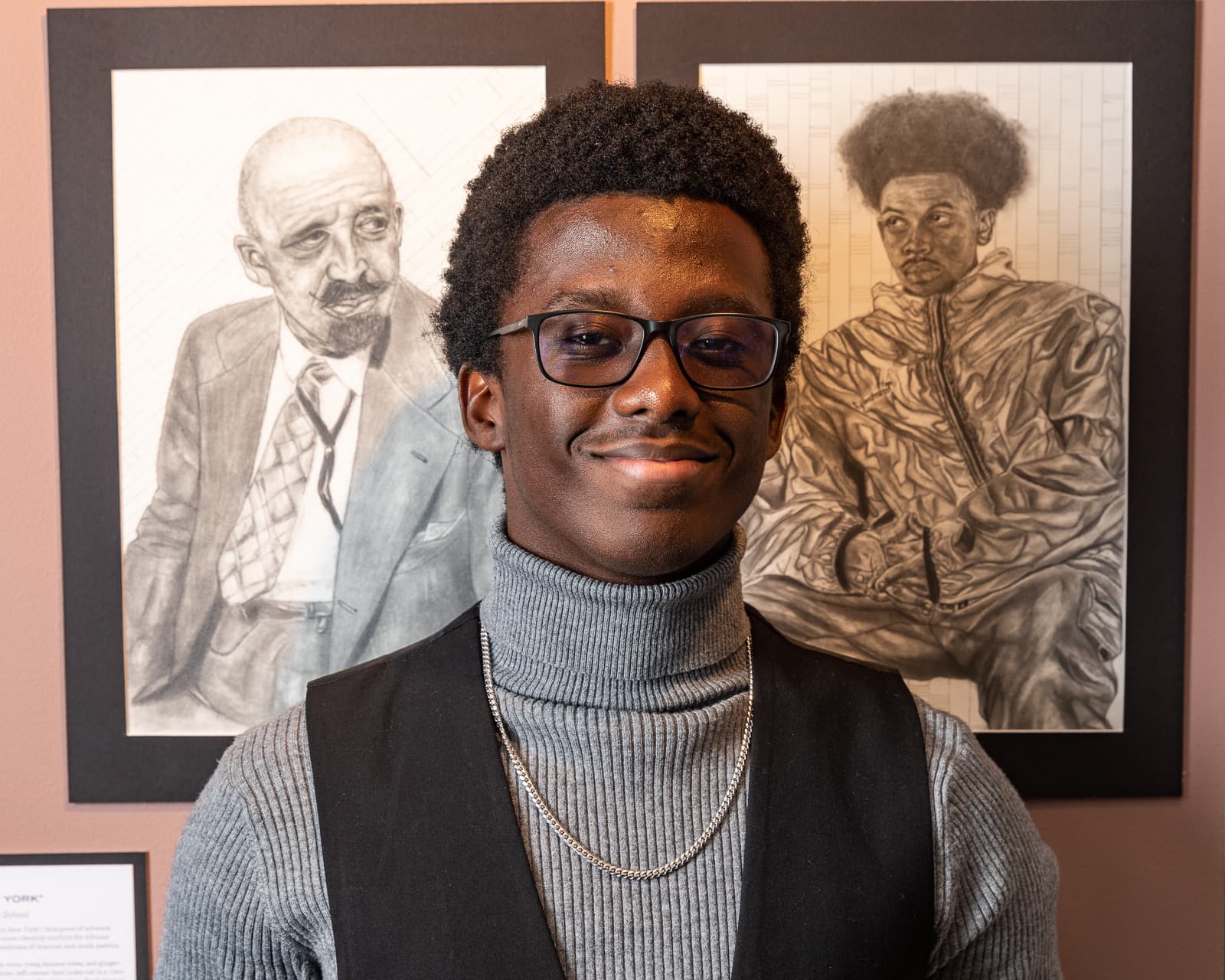 Standing beside my graphite portraits at the exhibition